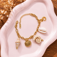 The Coastal Keepsake Charm Bracelet (Sandstone Shell)